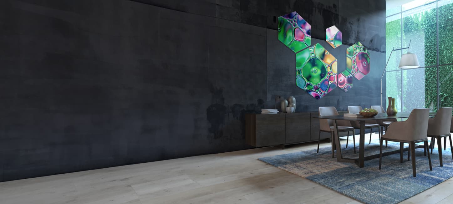 Glastrix UV print — hexagonal glass prints on dark wall
