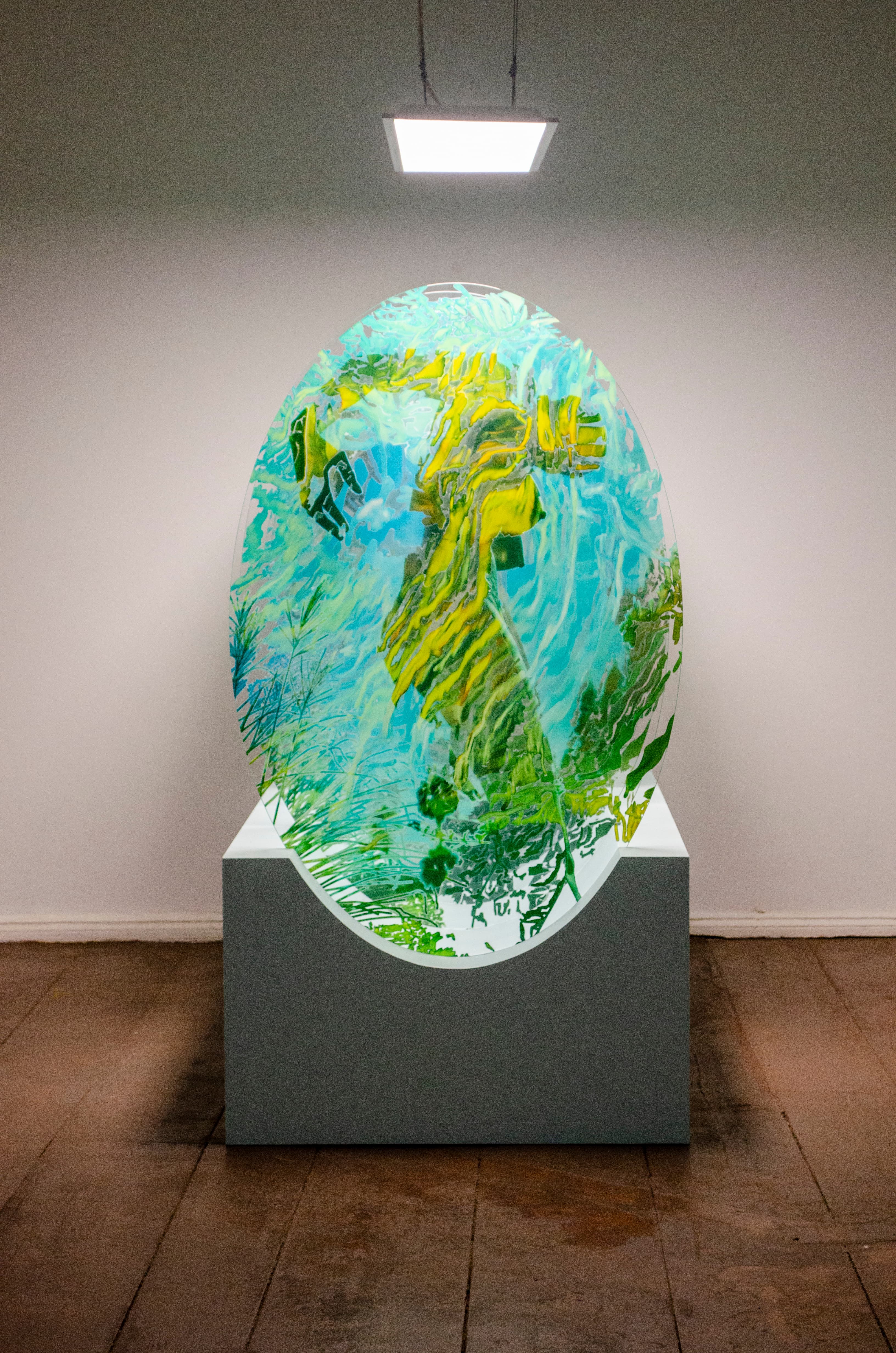 Layered glass oval art prints โ Semra Sevin, Beyond Belief exhibition, Kunsthaus Mitte Berlin