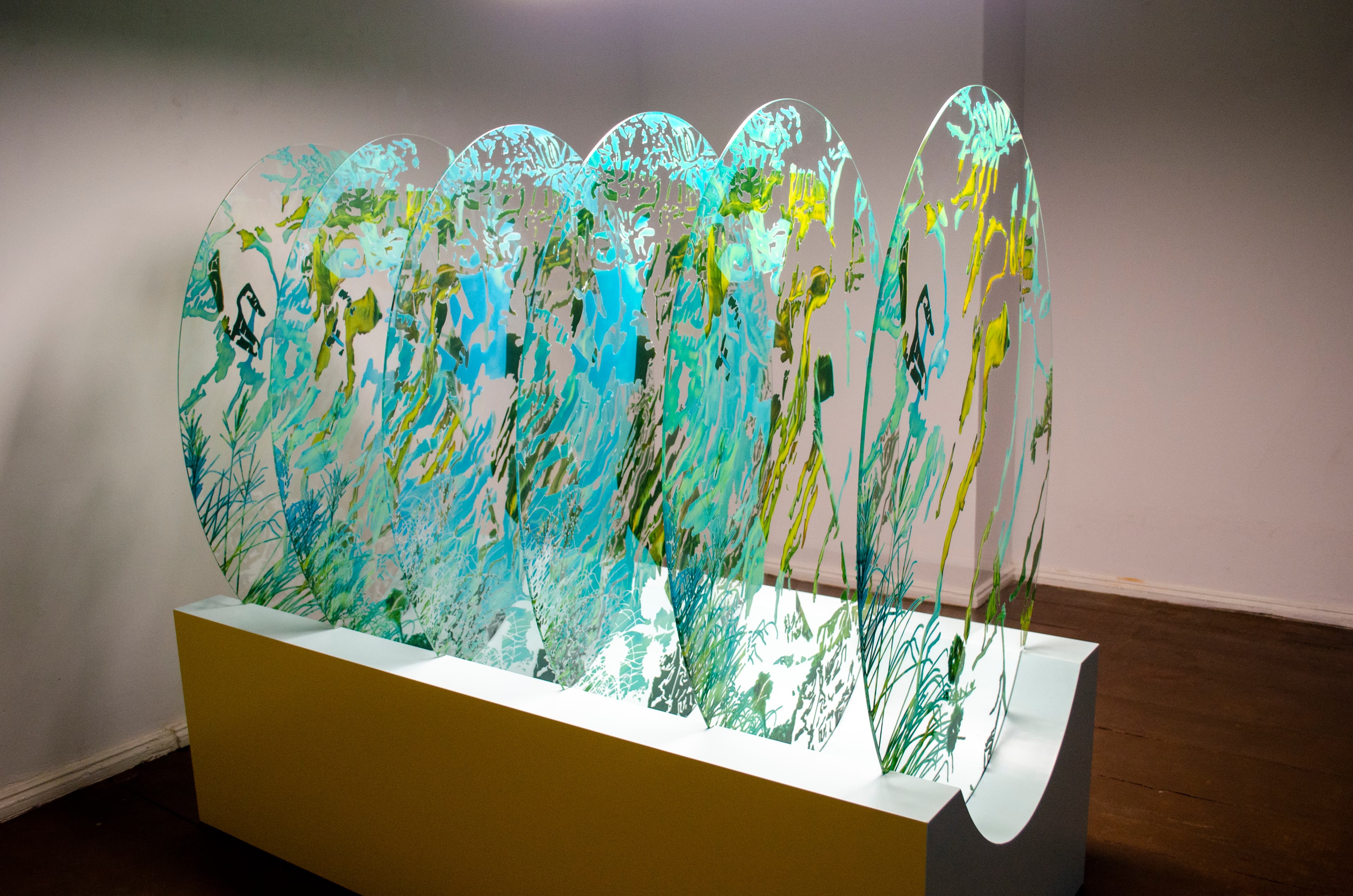 Layered glass oval art prints โ Semra Sevin, Beyond Belief exhibition, Kunsthaus Mitte Berlin